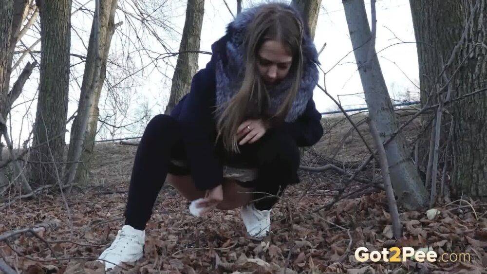 Short taken girl pulls down tights to take a pee while walking thru the woods - #6