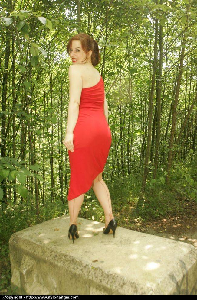 Seductive mature babe on high heels flashing her panties outdoor - #12
