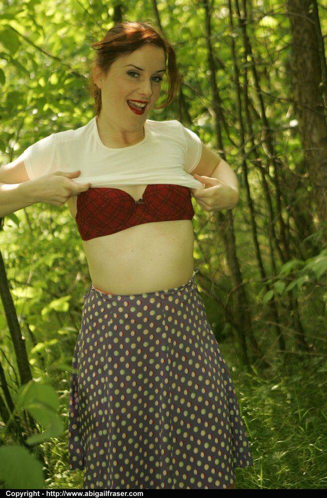 Redhead amateur pulls down satin panties in the woods before dressing - #5