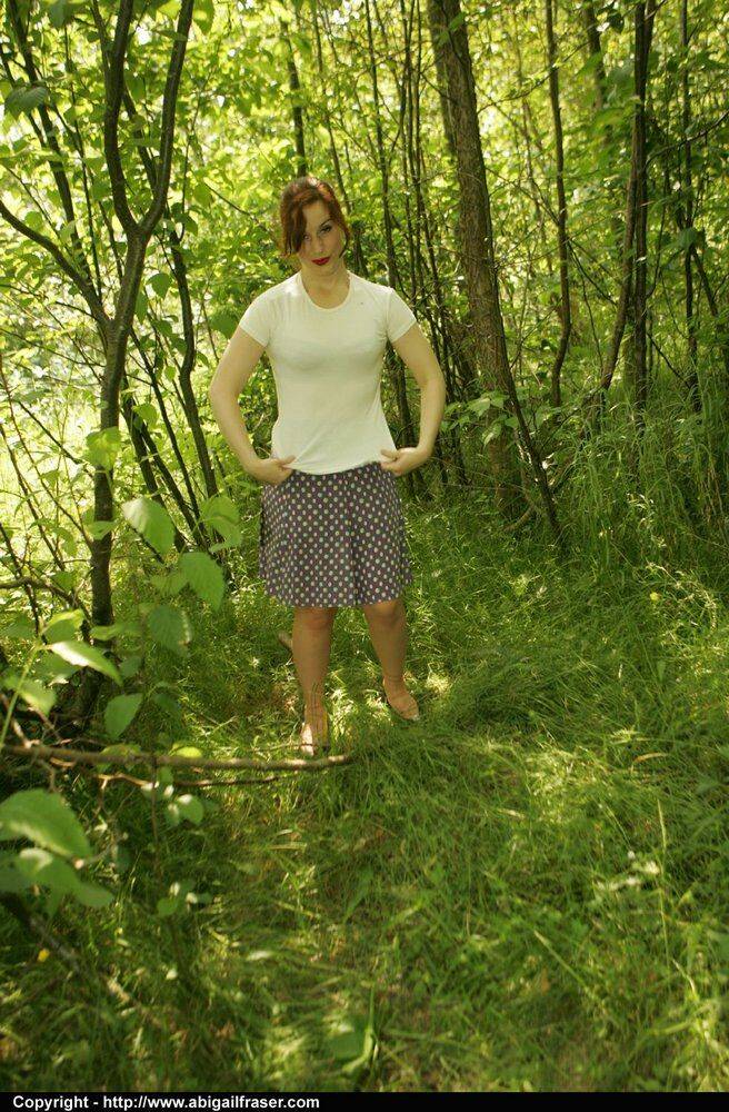 Redhead amateur pulls down satin panties in the woods before dressing - #12