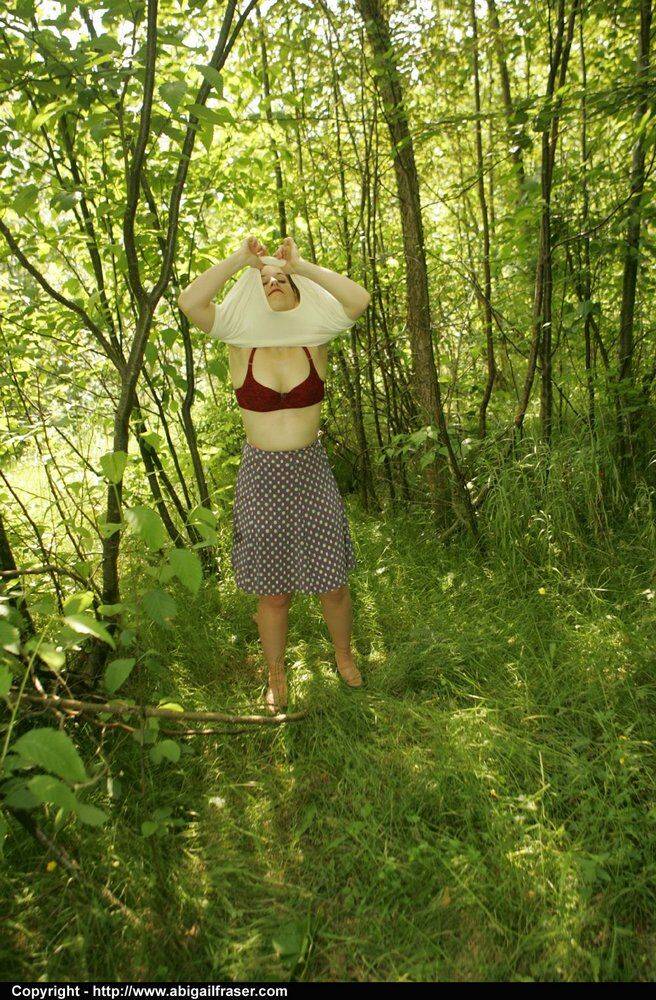 Redhead amateur pulls down satin panties in the woods before dressing - #2