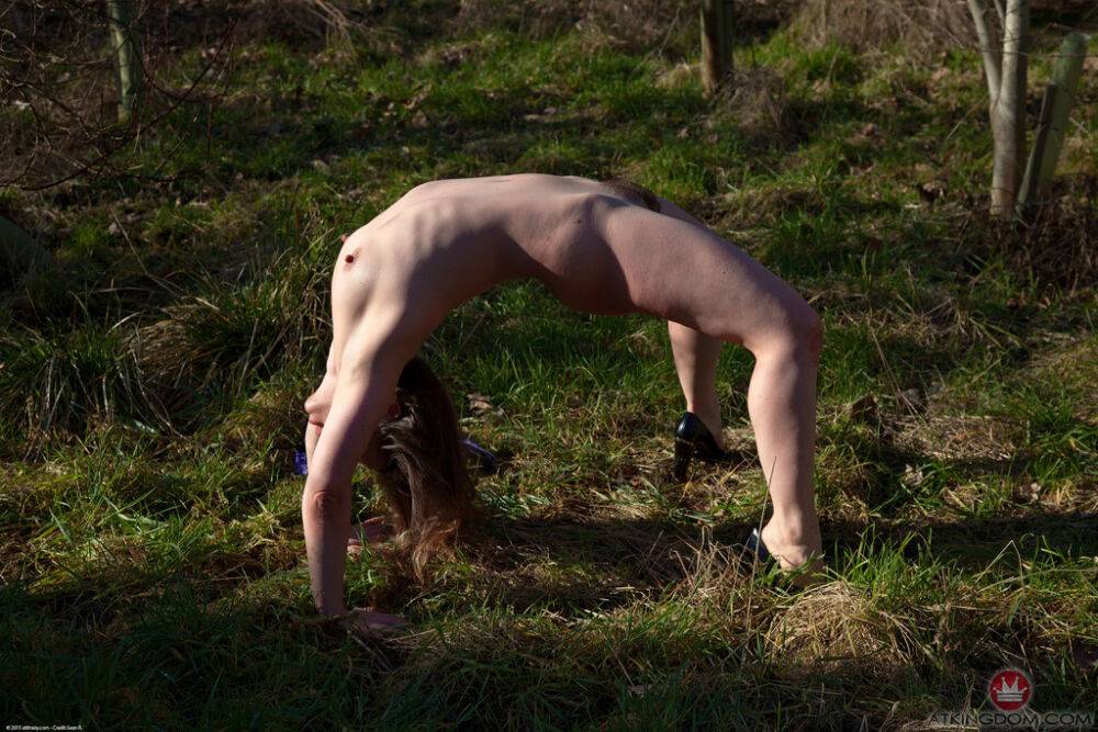 European pornstar Olga Cabaeva makes a nude show outdoors exposing hairy cunt - #6
