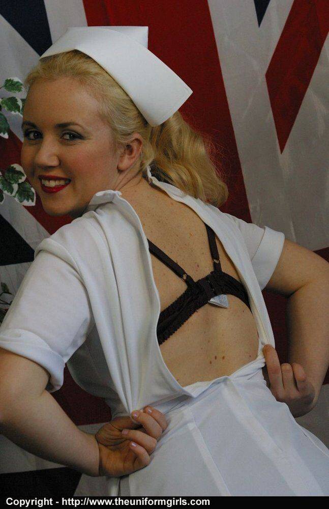 Blonde British nurse exposes her tits and snatch in tan nylons - #2