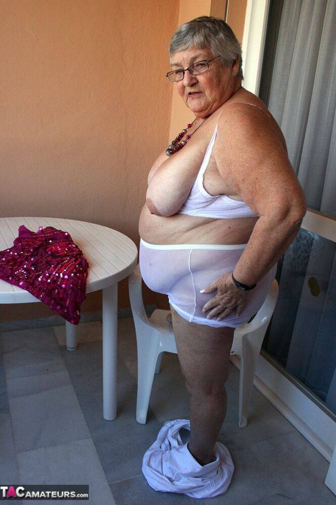 Obese grandmother GrandmaLibby parts her labia lips after disrobing on balcony - #3