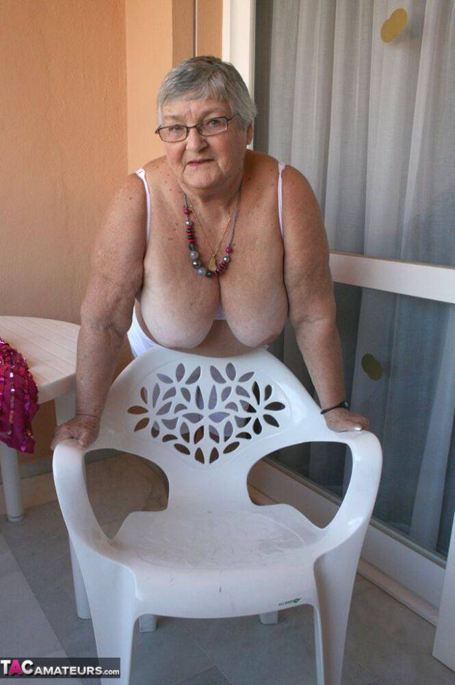 Obese grandmother GrandmaLibby parts her labia lips after disrobing on balcony - #9