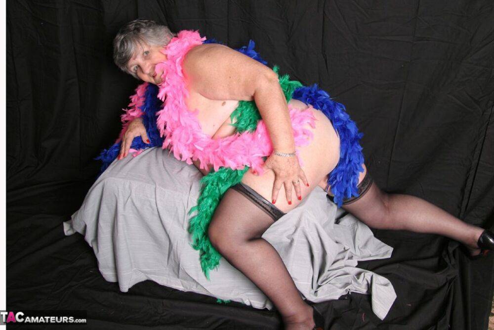 Fat UK amateur Grandma Libby shows her big tits while draped in feather boas - #3