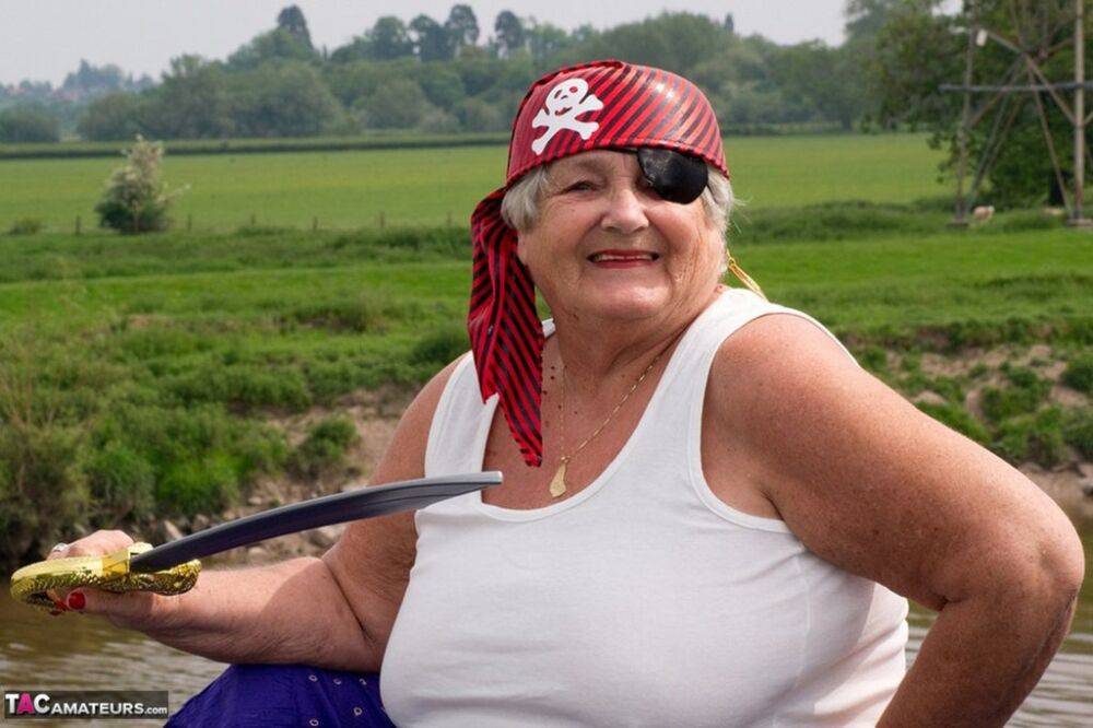 Fat British granny exposes herself on a bridge while sporting pirate attire - #8