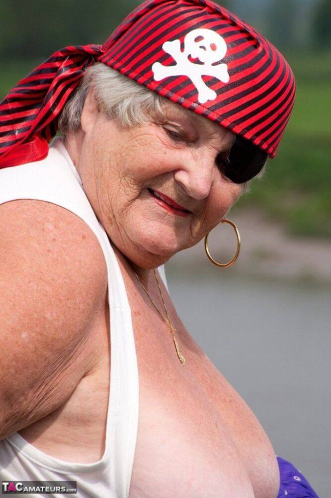 Fat British granny exposes herself on a bridge while sporting pirate attire - #12