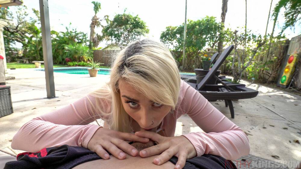 Blonde teen Indica Monroe delivers a POV blowjob on a poolside patio - #5
