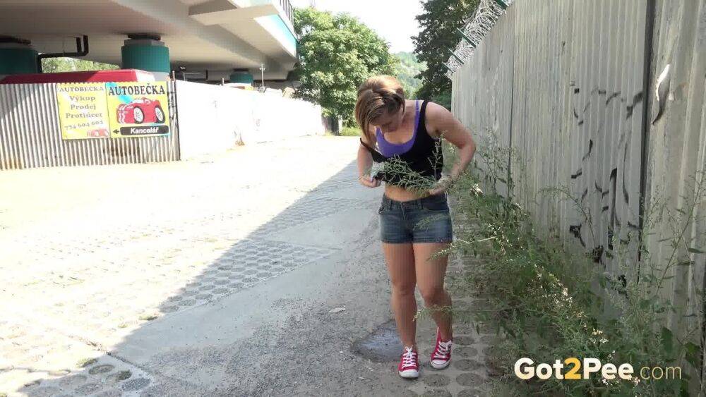 White girl pulls down her panties before squatting for a piss on country road - #4