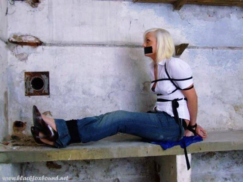 British woman is tied up and gagged in blue jeans and a white shirt - #7