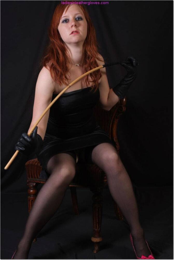 Sexy redhead flexes a cane before touching her tight slit with leather gloves - #14