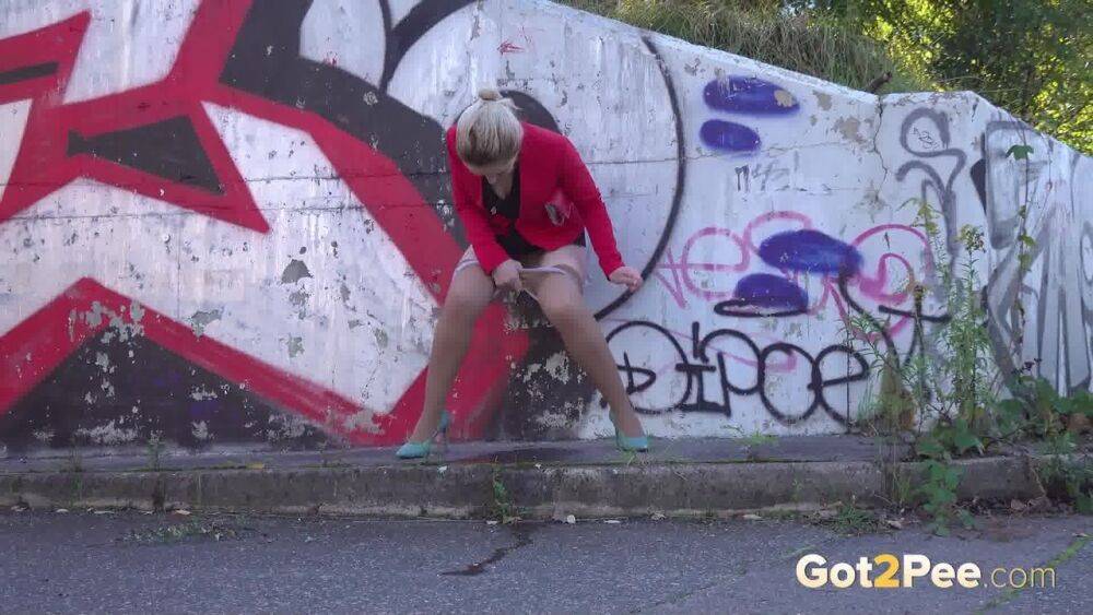 Di Devi squats near a bridge to piss outside - #6