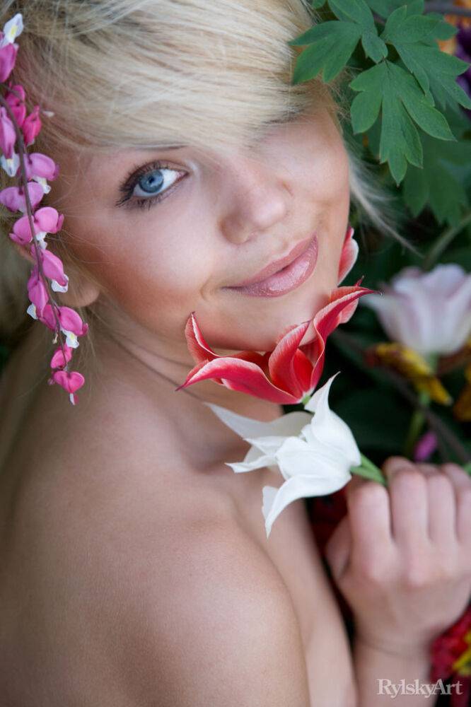 Cute young blonde Iveta poses in the nude while in a garden - #10