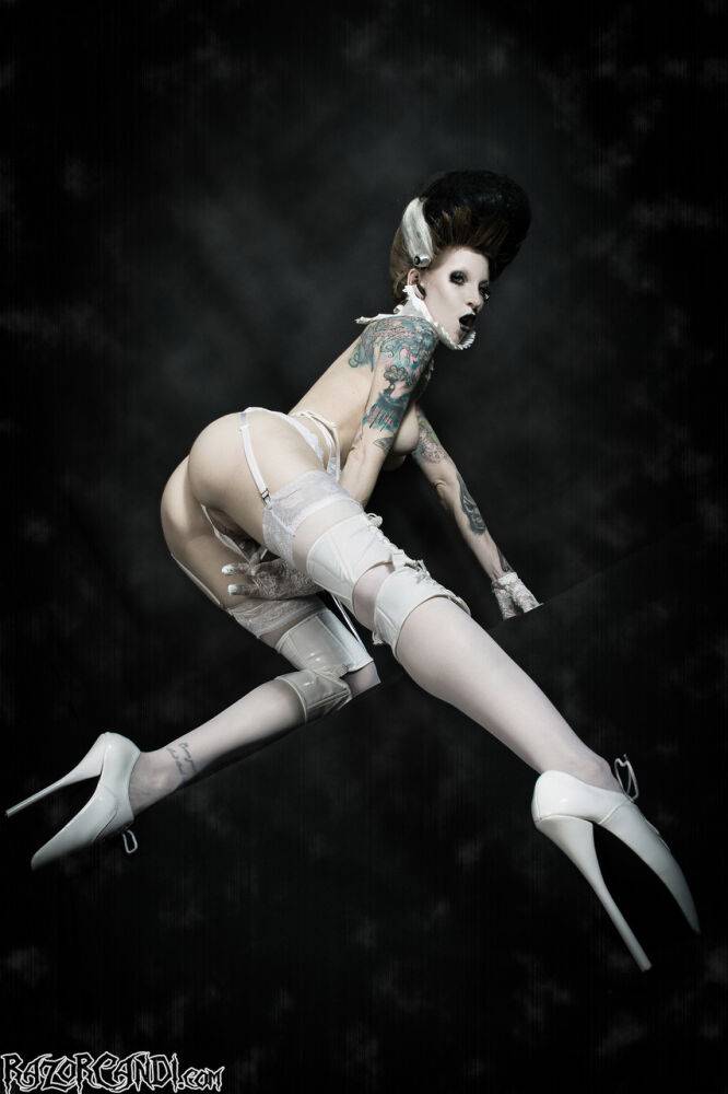 Tattoo model Razor Candi sucks on a big dildo in Bride of Frankenstein attire - #13
