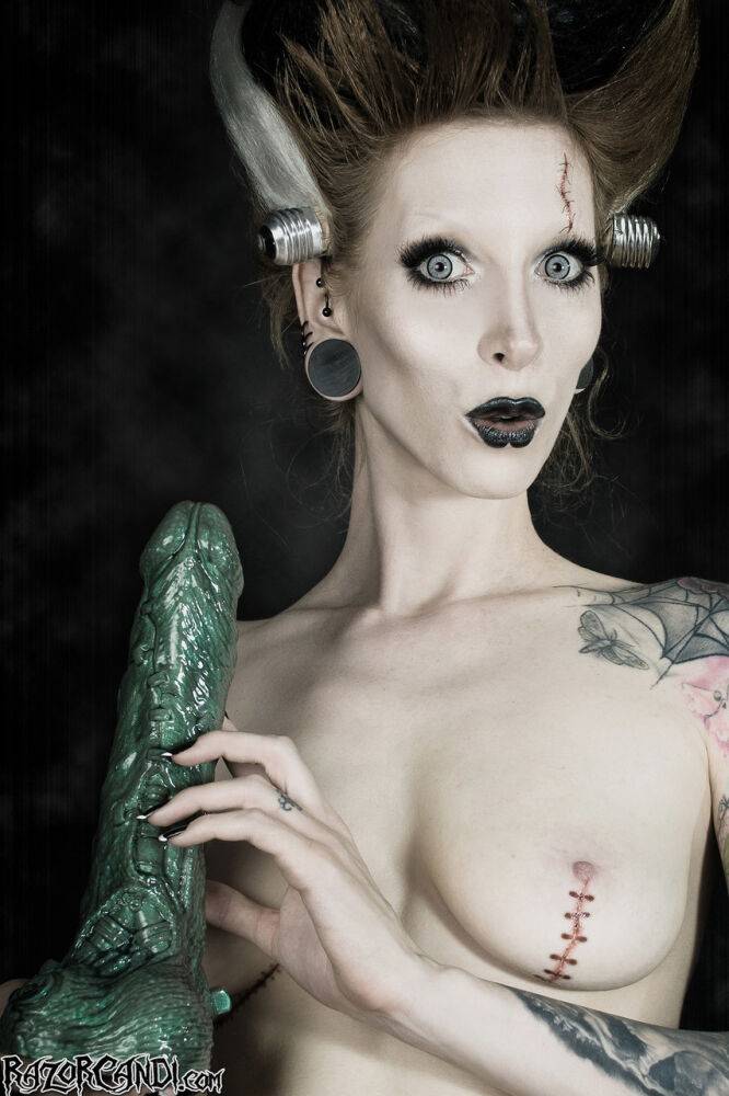 Tattoo model Razor Candi sucks on a big dildo in Bride of Frankenstein attire - #8