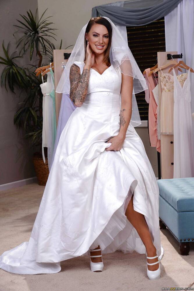 Tattooed Latina bride Juelz Ventura flashing leg and garter - #9