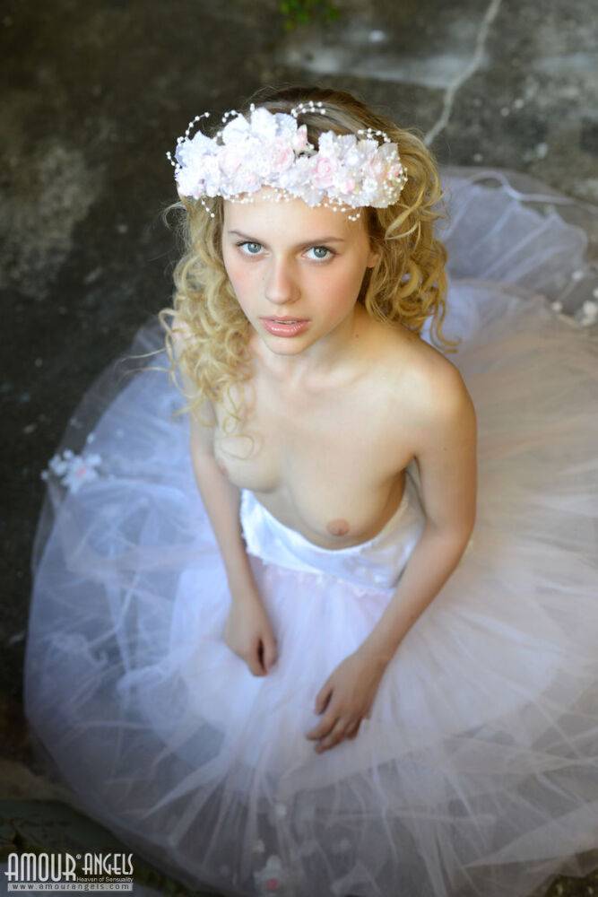 Blonde teen strips off her bridal gown and cotton panties for nude poses - #10
