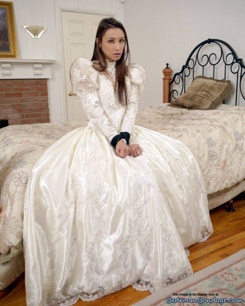 Brunette bride Celeste Star is ballgagged and tied up in her wedding dress - #1