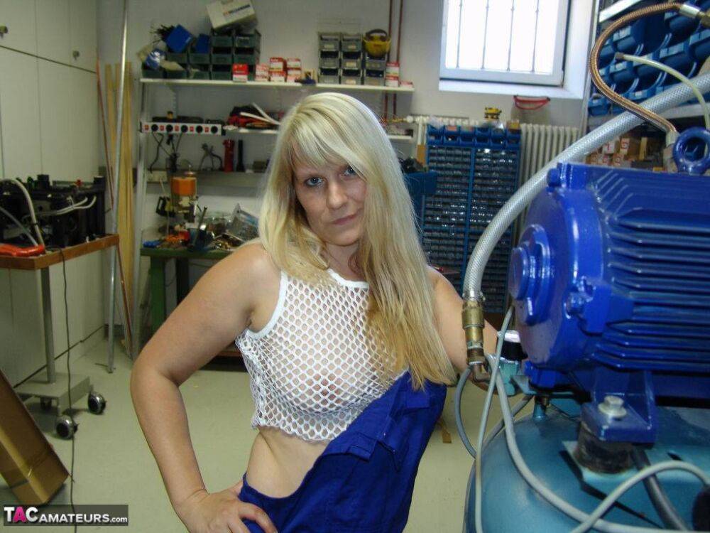 Mature blonde removes her overall before masturbating in workshop - #3