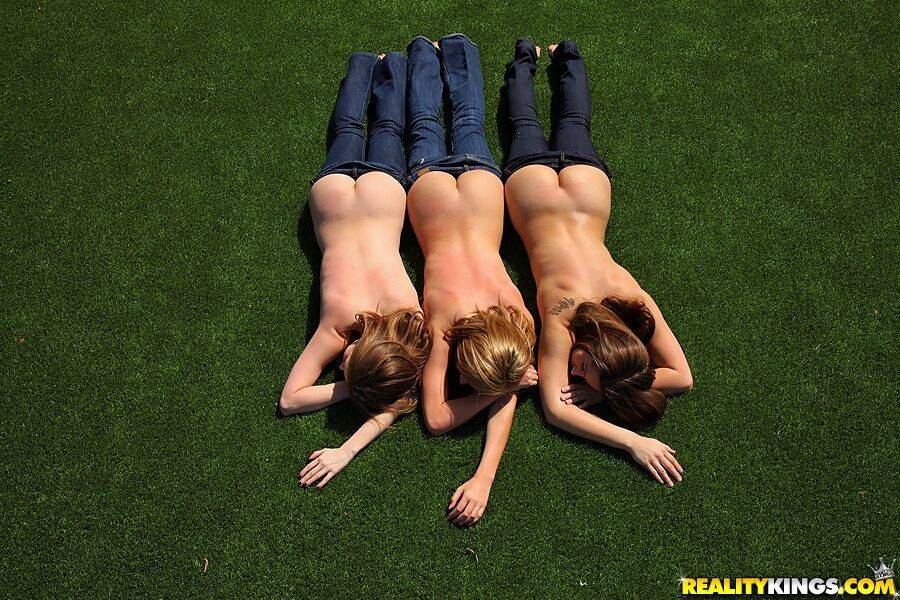 3 topless girls pull their blue jeans down over their bare asses on the lawn - #8