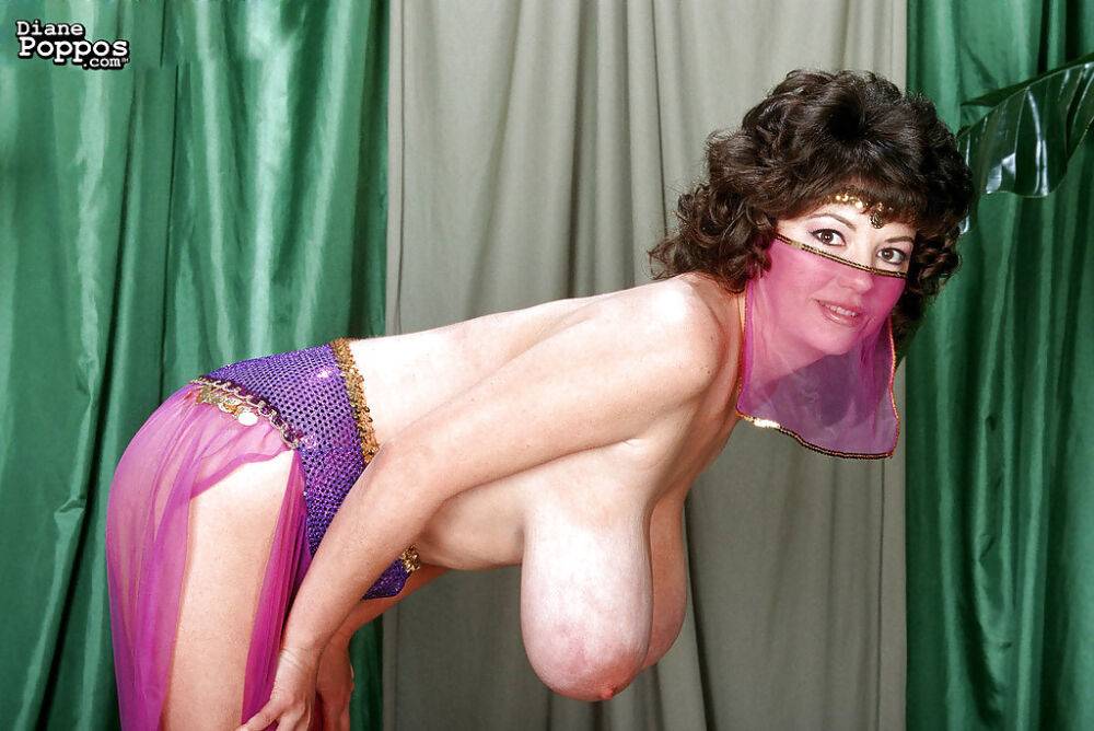 Mature Greek woman Diane Poppos letting big hanging tits fall free - #13