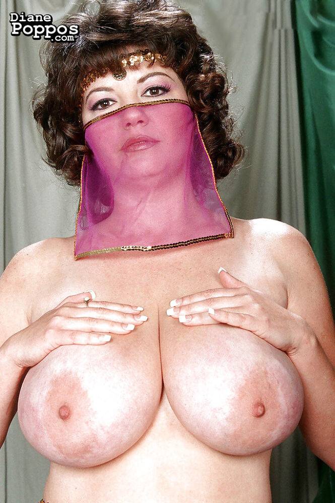 Mature Greek woman Diane Poppos letting big hanging tits fall free - #3
