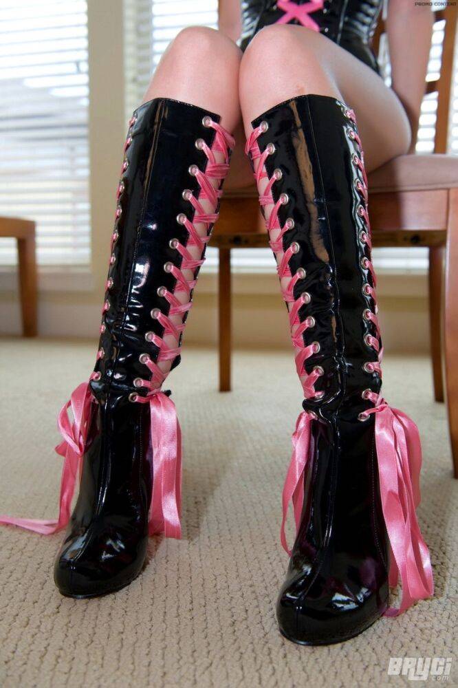 Hot brunette amateur lets her big tits slip from latex corset in boots - #6