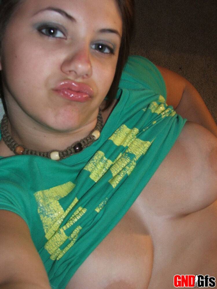 Young looking amateur takes self shots of her big natural boobs - #2