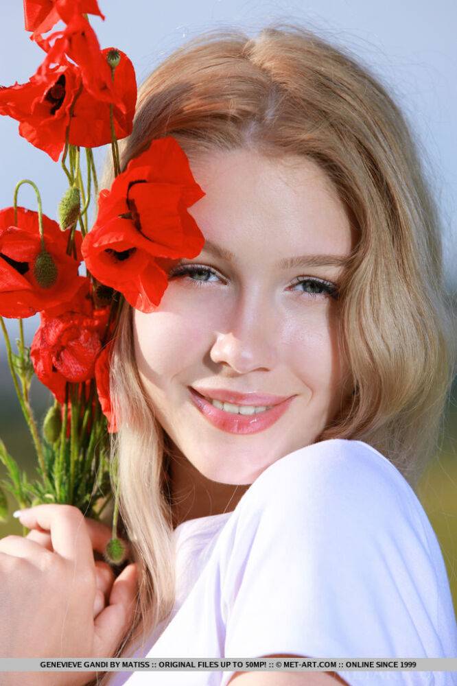 Sweet teen Genevieve Gandi strips naked in a field of blooming flowers - #8