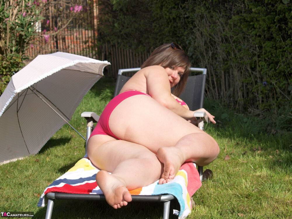 Fat amateur Roxy looses her giant boobs from a swimsuit in the backyard - #15