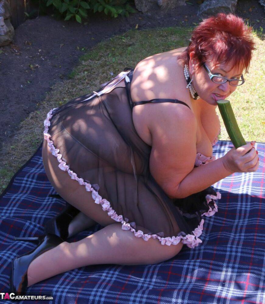 Mature BBW with red hair Warm Sweet Honey pleasures her twat with a cucumber - #11