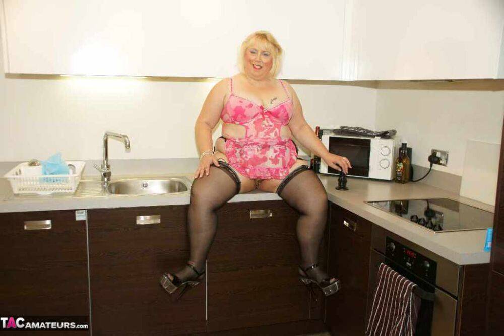 Fat UK blonde Lexie Cummings masturbates on her counter with a suction dildo | Photo: 4375622