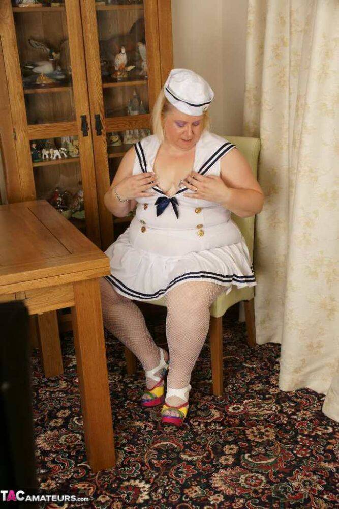 Blonde BBW Lexie Cummings plays with her pierced pussy in a sailor uniform - #1