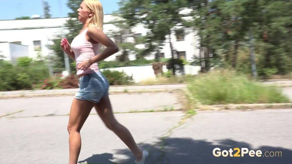 Blonde female Nikki Dream can't hold her pee any longer and squats on roadway - #13