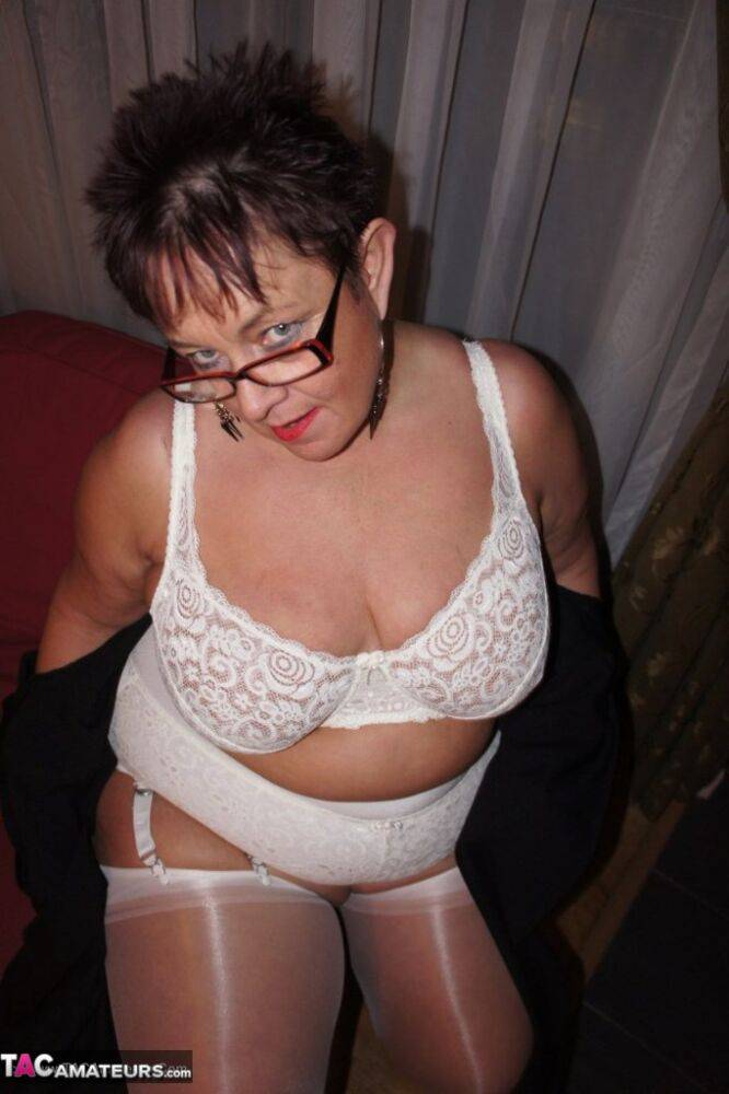 Older BBW Warm Sweet Honey sets her large tits free in hose and girdle panties - #7