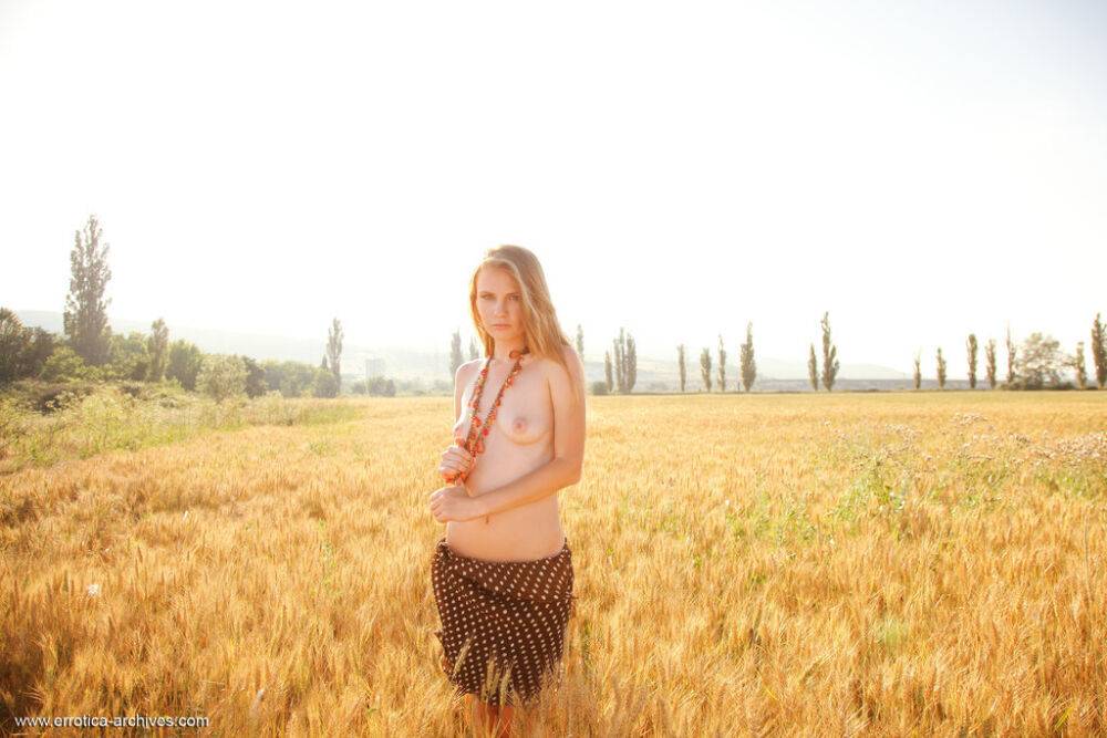 Young blonde beauty Frida C models naked while in a field of wheat - #14