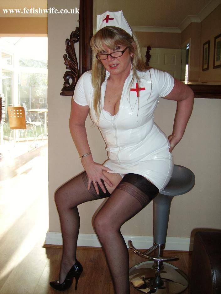 Fetish wife in nurse uniform and stockings - #7