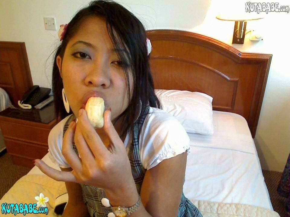 Asian bali teen girl blows banana - #13