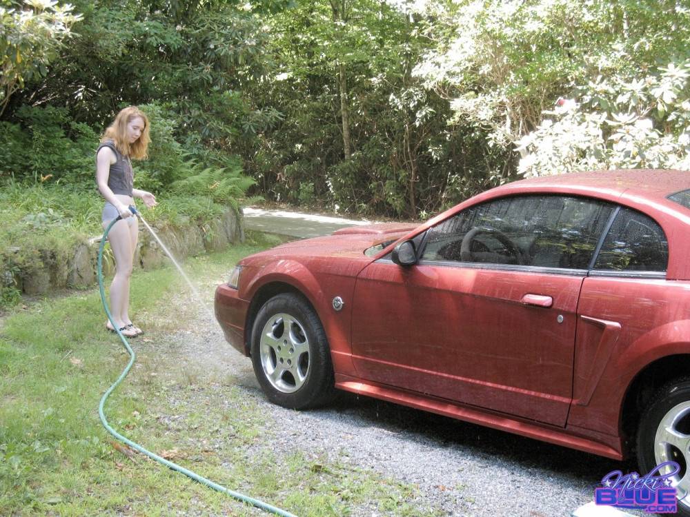 I am washing my old car. it is a 04 red mustang - #12