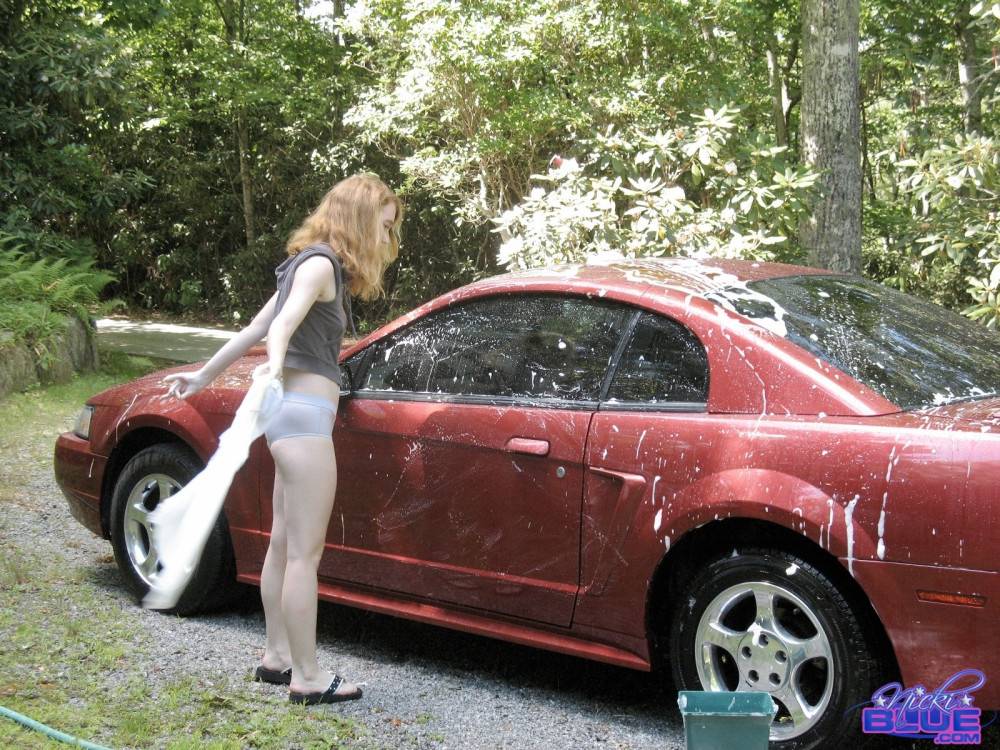 I am washing my old car. it is a 04 red mustang - #14