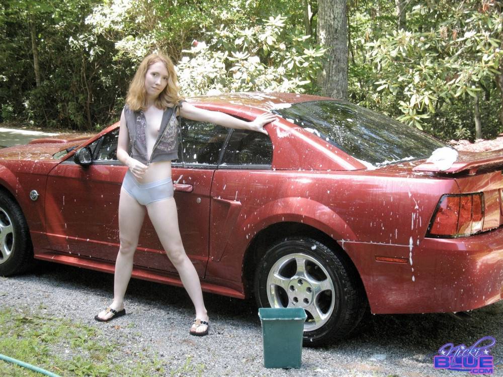 I am washing my old car. it is a 04 red mustang - #15