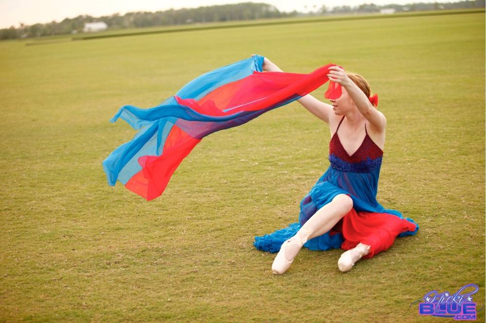 I am doing ballet in the grass. in these photos you get to see - #1