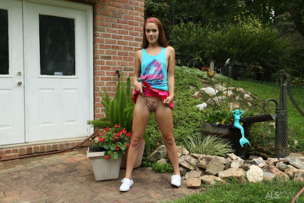 Hot redhead teen Kymberly Brix in sexy skirt exhibits tiny tits and toys her cunt outdoor - #5