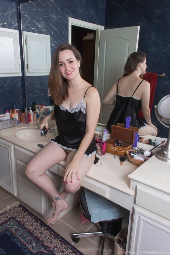 Sexy hottie Kelly Morgan in lingerie exhibiting big knockers and spreading her legs in bathroom - #2