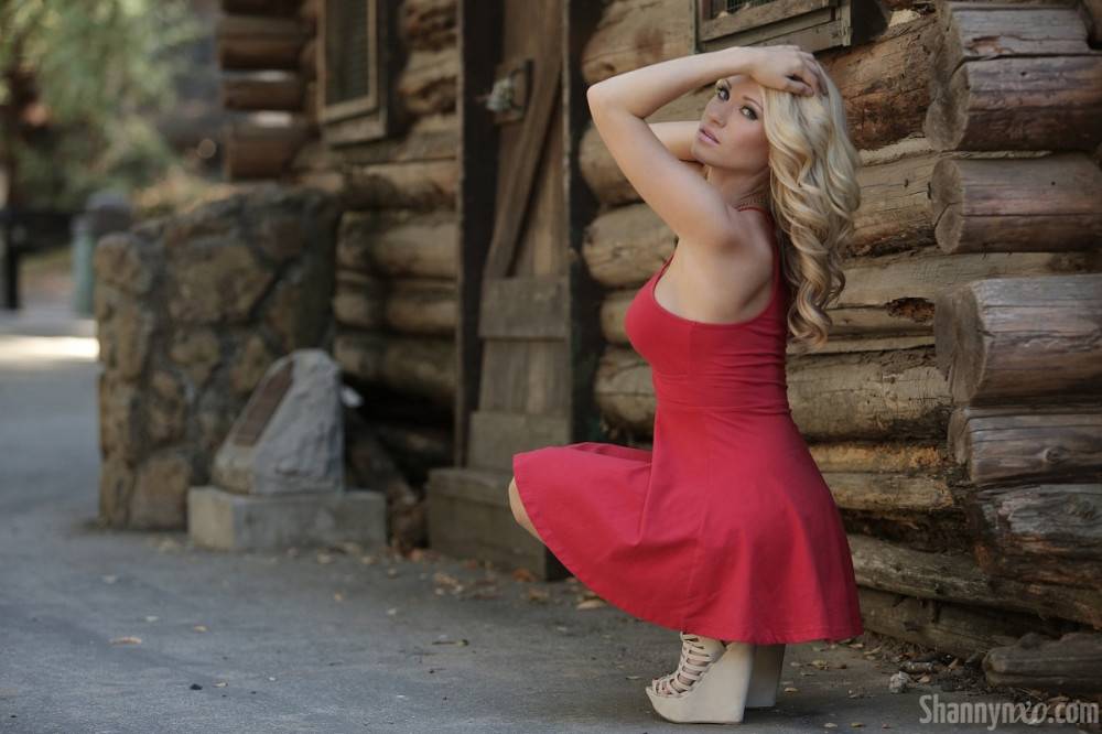 Lovely Lady In Red Shannyn XO Poses Besides A Secluded Cabin In The Woods And Teases With Her Legs. - #14
