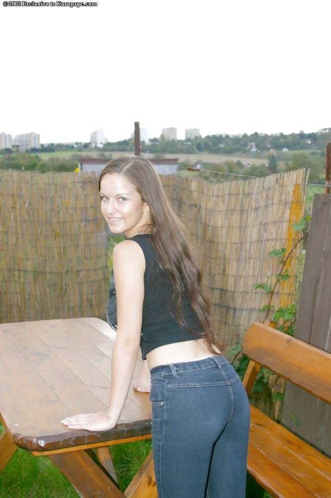 Foxy brunette teen Lucie in sexy jeans exposes big hooters and spreads her legs outdoor - #2