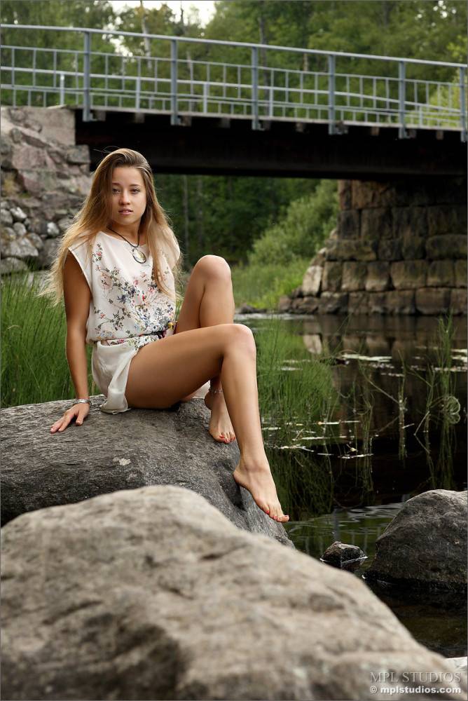 Eva Shanti Sit On The Rock With Her Bare Ass And Showing Pussy In Rather Poses On River Coast By The Bridge - #1