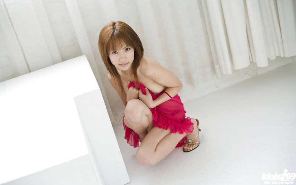 Stunning japanese teen Reika Shina in nice skirt exhibits her butt - #13