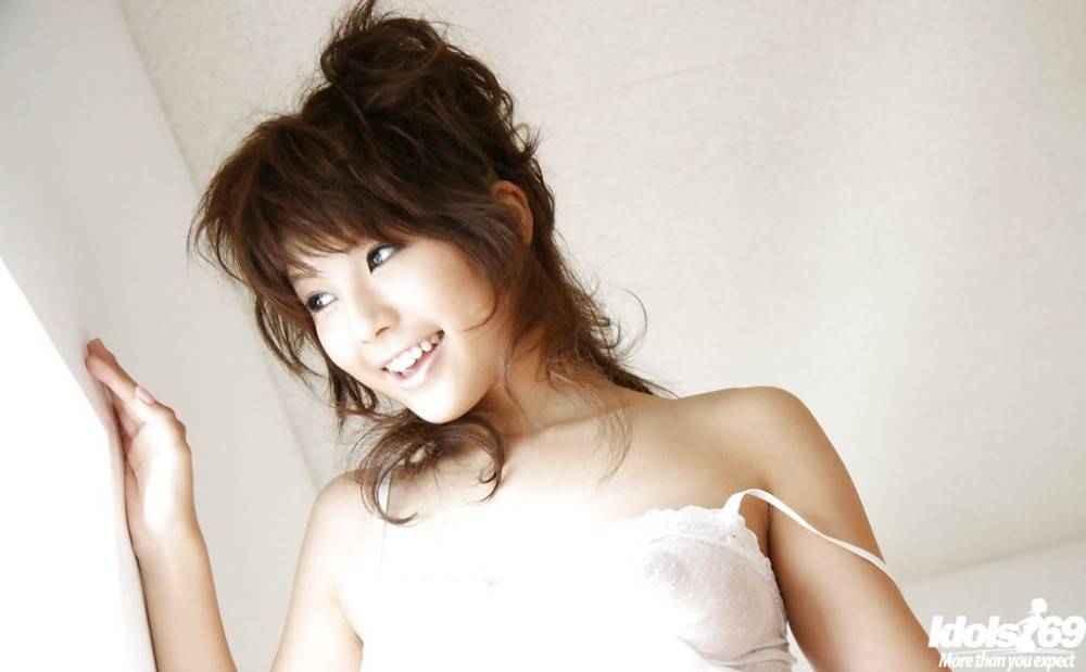 Charming japanese cutie Azumi Harusaki bares big titties and sexy ass - #1